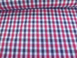 Een rood wit zwarte boerenbont ruit van 5 x 5 mm. Polyester e.d. 1.45 mtr. breed