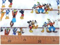 Disney stof Met Micky Mouse and friends  100% Gekaard poplin katoen (100% American Carded Cotton Poplin)  150 cm breed.  120 gr/