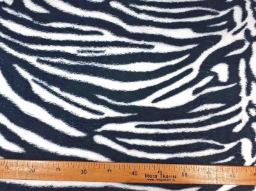Een superzachte coral fleece met een zwart/witte tijgerprint  100% polyester  1,50 meter breed  240 gram p/m²