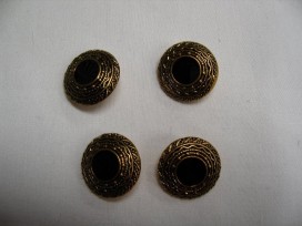 Goudkleurige kunststof klederdracht knoop met zwart. 20 mm. doorsnee. 