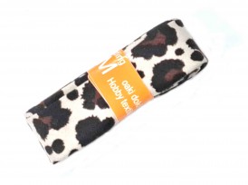 Biaisband met koeienprint in een bundel van 2 meter lang.  Bruin/zwart/wit  2 cm breed  100 % katoen