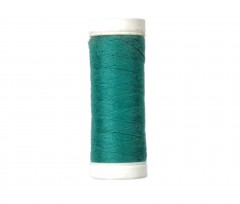  Synka naaigaren.  Donker turquoise 200 mtr. polyester allesnaaigaren.