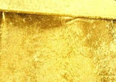 Velours de panne helder goud. Glanzend en soepel vallend. 100% Polyester  147cm  170 gr/m2