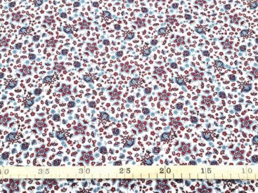 Katoen met een bloemprint print. By Poppy Europe.  100% katoen  1.40 mtr. breed