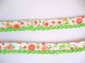 Biaisband met lime ruche Wit met oranje/gele bloem 41