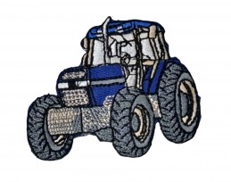 Applicatie van een blauwe tractor  Deze is opstrijkbaar  Afmetingen ongeveer 6,5 cm x 5,5 cm.