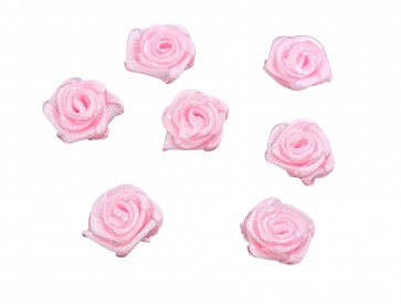 Een roze opnaaibaar roosje  Doorsnee ongeveer 12 mm  Deze roosapplicaties worden per stuk verkocht