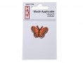 Vlinder applicatie,van HKM  Opstrijkbaar.  Oranje met wit en zwart randje  Ongeveer 3,5 x 2,5 cm