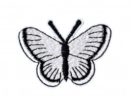 Vlinder applicatie, van HKM  Opstrijkbaar.  Zilvergrijs glitter  Ongeveer 5 x 3,5 cm
