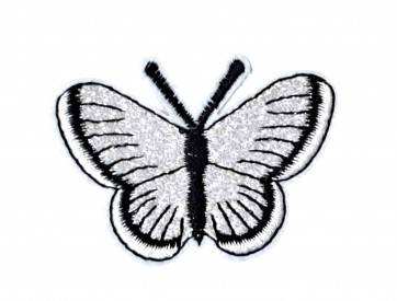 Vlinder applicatie, van HKM  Opstrijkbaar.  Zilvergrijs glitter  Ongeveer 5 x 3,5 cm