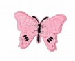 Een roze vlinder applicatie van 7 x 6 cm.  Om te plakken of te strijken, 2 in 1.