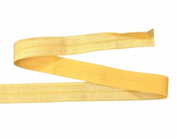 Elastisch vouwtres biaisband.  Geel.  20 mm breed.  Elastisch biaisband wordt gebruikt om rekbare stoffen af te werken.