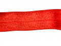 Elastisch vouwtres biaisband.  Helder rood.  20 mm breed.  Elastisch biaisband wordt gebruikt om rekbare stoffen af te werken.