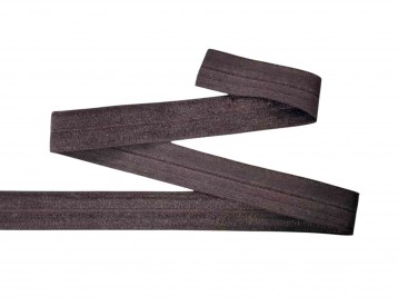 Elastisch vouwtres biaisband.  Bruin  20 mm breed  Elastisch biaisband wordt gebruikt om rekbare stoffen af te werken.