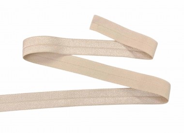 Elastisch vouwtres biaisband.  Beige.  20 mm breed.  Elastisch biaisband wordt gebruikt om rekbare stoffen af te werken.