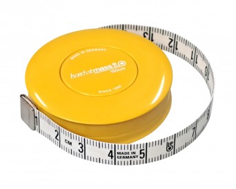 Rolcentimeter van het merk Hoechstmass.  Kleur geel. Het meetlint is 150 cm lang  Afmeting: 50 mm doorsnee, 14 mm dik.