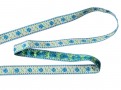 Lichtzand kleurig sierband met een aqua bloem en een lichtblauw randje  Ongeveer 18 mm breed