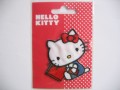 Een Hello Kitty opstrijkbare applicatie 6x7,5 cm 