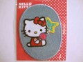 Hello Kitty ovaal jeans Zittend met lolly