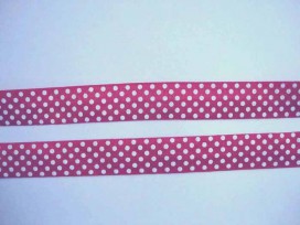 Fuchia kleurig elastisch biaisband met witte stip. 2 cm. breed 