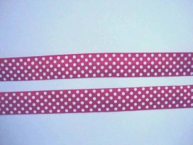 Fuchsia kleurig elastisch biaisband met witte stip. 2 cm. breed 