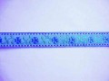 Lichtaqua kleurig sierband met een aqua bloem en een blauw randje  Ongeveer 19 mm breed