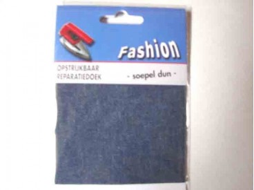 Reparatiedoek van jeans. Middelblauw Zo kunt u in 1 keer een groot oppervlak repareren. Opstrijkbaar 10 x 40 cm.