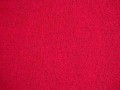 Een soepelvallende gebreide rode tricot. Voelt aan als katoen.  100% polyester  1.45 mtr. br.