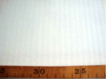 Zware kwaliteit offwhite stretch katoen met een ingeweven mini streepje. 62%katoen/36% poly./ 2% ly  1.60 mtr.  215 gram p/m²