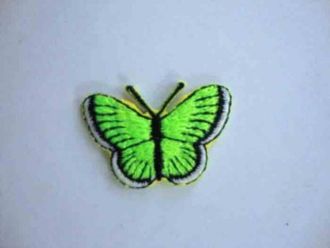 Een opstrijkbare vlinder applicatie van 3 x 2.5 cm. Neon groen