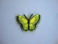 Een opstrijkbare vlinder applicatie van 3 x 2.5 cm. Neon geel