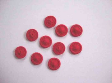 Rode opnaaibare pailletten.  Doorsnee 12 mm.  De prijs is voor 1 zakje met 10 pailletten