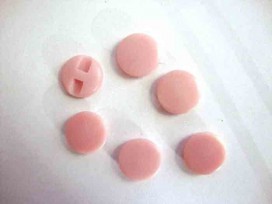 Kunststof knoop in 2 maten Glad Roze met een doorsnee van 20 mm.
