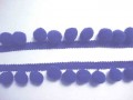 Kobalt blauw pom pom sierband, oekotex. De bolletjes hebben een doorsnee van 10 mm.